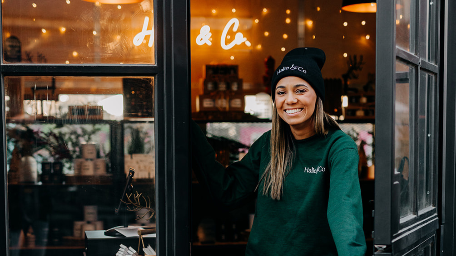 Halie in front of her shop at the midtown markets in Detroit.